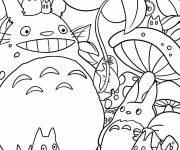 Coloriage Totoro avec Susuwatari en forêt