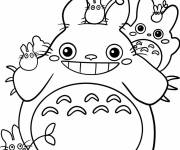 Coloriage Totoro jouant avec des Totoros plus petits