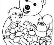 Coloriage Nounours et le gar&ccedil;on arrose les fleurs