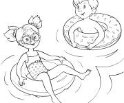 Coloriage Fille et gar&ccedil;on en nageant dans la piscine
