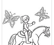 Coloriage Fille jouet Playmobil sur un cheval avec des papillons