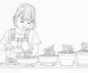 Coloriage La fille arrosant la fleur dans un pot