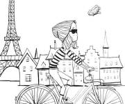 Coloriage Fille sur v&eacute;lo devant la Tour Eiffel