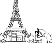 Coloriage Le jeune gar&ccedil;on prends une photo de la Tour Eiffel