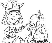 Coloriage Petit viking pr&eacute;pare son diner