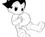 Coloriage Petit Astro Boy qui joue avec le ballon