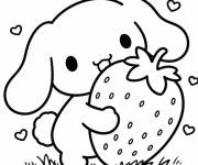 Coloriage Cinnamoroll serrant une grosse fraise