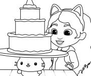 Coloriage Gabby a pr&eacute;par&eacute; un g&acirc;teau avec son chat