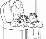 Coloriage Garfield dort sur Jon