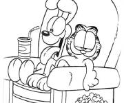 Coloriage Garfield et Odie en regardant la télé