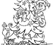 Coloriage Grinch se cache derrière le sapin de Noel