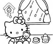 Coloriage Hello Kitty boit du thé