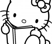 Coloriage Hello Kitty lit un livre