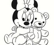 Coloriage Bébé Minnie Mouse avec sa peluche