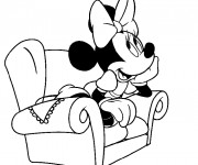 Coloriage Minnie assise sur un fauteuil