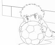 Coloriage Le tout petit Olivier Atton jouant avec le ballon