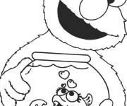 Coloriage Elmo avec son poisson