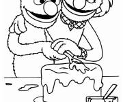 Coloriage Elmo et sa maman pr&eacute;parent le g&acirc;teau