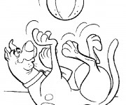 Coloriage Scooby doo joue au ballon
