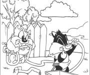 Coloriage Taz joue avec Daffy