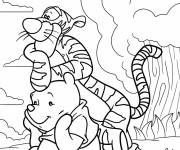 Coloriage Winnie tra&icirc;ne avec Tigrou