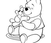 Coloriage Le temps de dormir de Winnie ourson