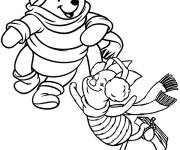Coloriage Ourson et porcelet patinent sur glace
