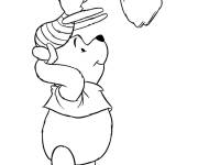 Coloriage Winnie aide Porcelet &agrave; atteindre la pomme