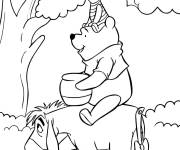 Coloriage Winnie et porcelet assis sur Bourriquet