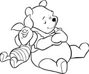 Coloriage Winnie et Porcinet en se reposant