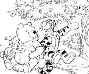 Coloriage Winnie et Tigrou sur un branche d'arbre