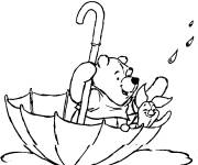 Coloriage et dessins gratuit Winnie flotte dans un parapluie à imprimer