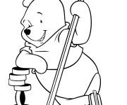 Coloriage Winnie l'ourson joue au hockey