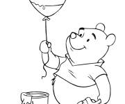 Coloriage Winnie ourson avec un ballon bien d&eacute;cor&eacute;
