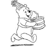 Coloriage Winnie ourson avec un g&acirc;teau d'anniversaire