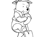 Coloriage Winnie ourson creuse un troue