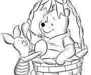 Coloriage Winnie ourson dans un panier d'oeuf de P&acirc;ques