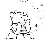 Coloriage Winnie ourson et l'abeille qui essaie de prot&eacute;ger son miel