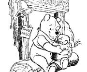 Coloriage Winnie ourson et le miel magique