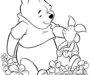 Coloriage Winnie ourson et Porcinet parmi les fleurs