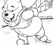 Coloriage Winnie ourson fait du patin