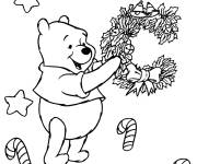 Coloriage Winnie ourson pendant la f&ecirc;te de Noel