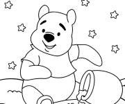 Coloriage Winnie Ourson renversant un pot de miel