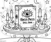 Coloriage Livre de sorts Hocus Pocus sur une table &eacute;clair&eacute;e &agrave; la bougie