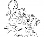 Coloriage Les petits  dalmatiens &eacute;tirent une claquette