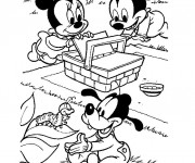 Coloriage Les petits Mickey, Minnie et Pluto en picnic