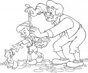 Coloriage Pinocchio joue avec Figaro