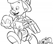 Coloriage Pinocchio mange une pomme