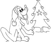 Coloriage Pluto décore le sapin de Noel