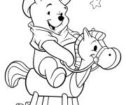 Coloriage Winnie l'ourson &agrave; cheval en bois